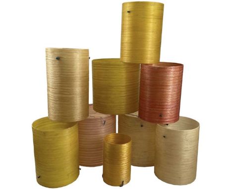 A circa 1960/70s fibreglass red striped lamp shade together with eight other fibreglass lamp shades of various sizes ranging 