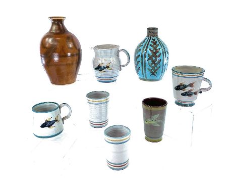 A Lamorna pottery lamp base together with a Lamorna pottery vase and six other Lamorna pottery items decorated with fish. (8)