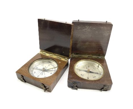 An early 20th century compass in mahogany case with metal dial and black enamel markings, 8cm square, together with another s