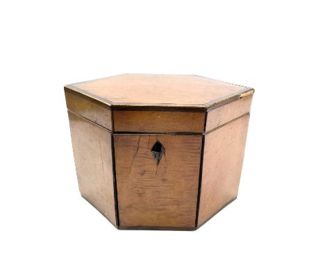 A George III satinwood and crossbanded tea caddy, of hexagonal section, width 18.5cm.Lot 56There are two small sections of cr