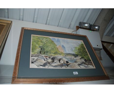 A framed and mounted Watercolour of a River Landscape with a stone bridge and rocky banks, signed lower right R. N. Edmondson