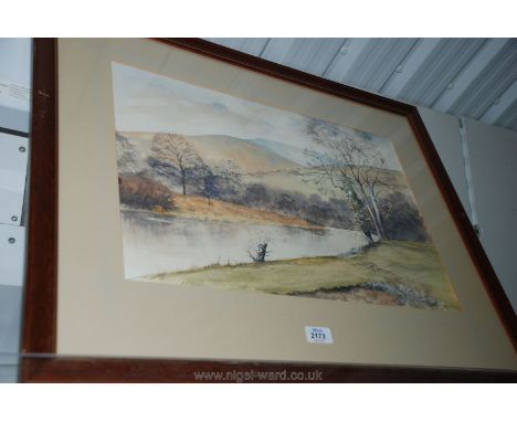 A framed and mounted Watercolour of River landscape with rolling hills in the distance signed lower left R. N. Edmondson