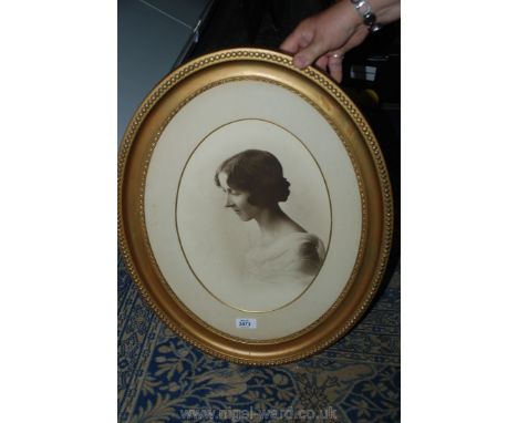 A Sepia Portrait of a Lady in oval gilt frame 