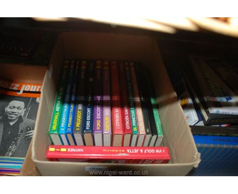 A box of Haynes Manuals, Guide to Ireland, Book on Longitude, etc 