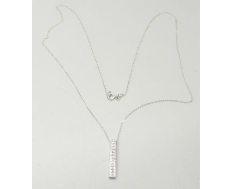 A 9ct white gold and diamond pendant on a fine 9ct gold chain, 1.4g 