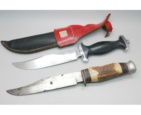 A dagger with scabbard, the blade marked Rehwappen Solingen, and one other dagger wtih antler handle, no scabbard 