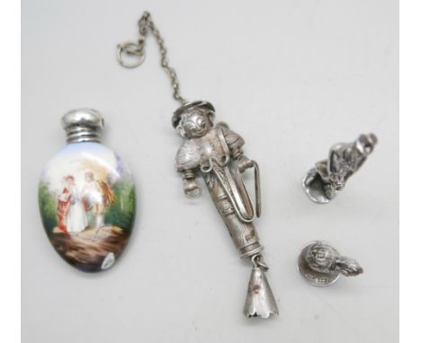 An enamel and silver topped scent bottle, a/f, two hallmarked silver models, a gentleman and a hen, and a novelty white metal