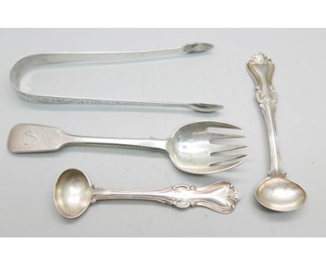 A pair of silver sugar bows, a pair of Victorian Scottish silver mustard spoons and a Victorian silver fork, 93g 