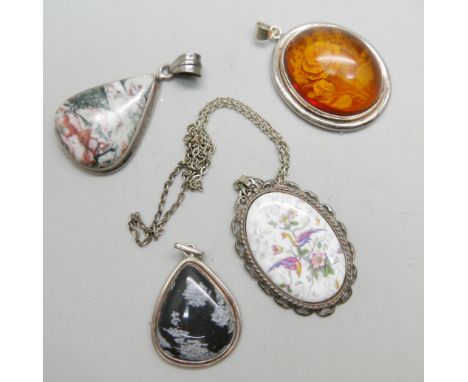 A hallmarked silver Coalport plaque pendant, a silver and amber coloured pendant, and two other pendants, silver chain 43cm 