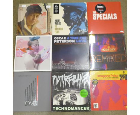 Ten new/unplayed LP records, some sealed, Bob Dylan, The Specials, Erasure, Oscar Peterson, etc. 