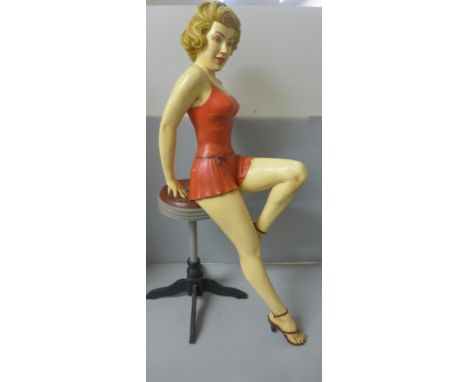 A Jun Asilo Marilyn Monroe composition figure sat on a bar stool, 66cm 