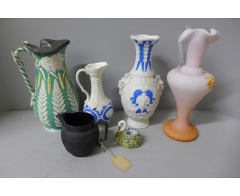 A Victorian Staffordshire 19th Century pottery pitcher in a fern pattern, one hand painted jug, two blue and white vases, etc