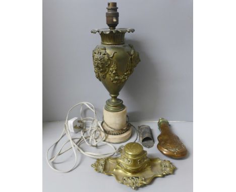 An ornate Art Nouveau brass ink stand, a vintage metal nutmeg grater, a copper and brass powder flask and a gilt metal lamp b