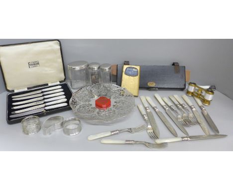 A pierced dish, dessert knives and forks, glass jars, a pair of French opera glasses, guilloche enamel a/f, etc. 