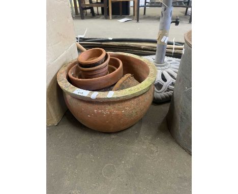 Terracotta garden planter and smaller terracotta pots