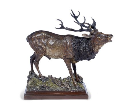 AN AUSTRIAN COLD-PAINTED BRONZE MODEL of a stag, late 19th/early 20th Century, stamped Geschutzt, the rutting stag on a natur