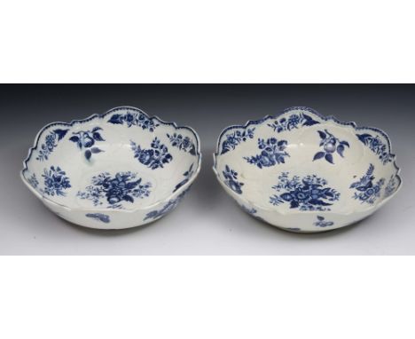 A PAIR OF 18TH CENTURY WORCESTER BLUE AND WHITE FRUIT BOWLS printed with the pine cone pattern, and having shaped borders, 26