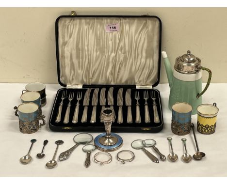 A set of five Crown Staffordshire or Royal Worcester coffee cans in silver holders; six silver spoons; a Royal Worcester silv