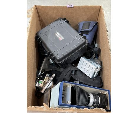 Two boxes of camera accessories.