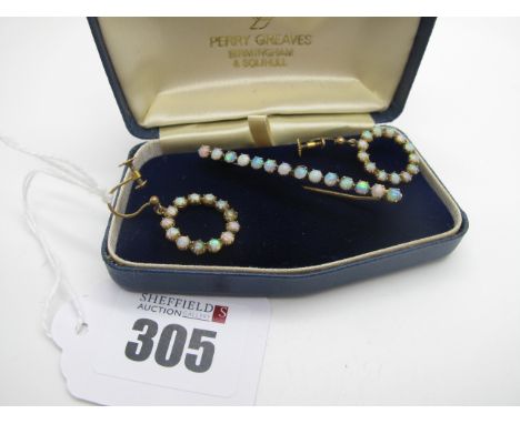 A Vintage Opal Set Bar Brooch, of uniform design claws set; together with a pair of opal set circlet earrings, stamped "9ct",