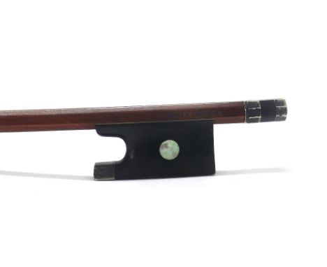 Silver mounted violin bow stamped E. Sartory á Paris, the stick round, the ebony frog inlaid with pearl eyes and the ebony ad