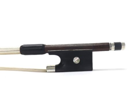 Silver mounted violin bow, unstamped, the ebony frog inlaid with pearl eyes and the ebony adjuster with two silver bands, 53g