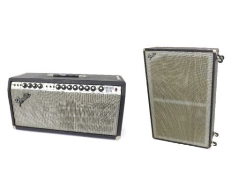 1970s Vibrasonic reverb head, chassis no. F939775, appears to be in working order; together with a dual showman reverb D140 s