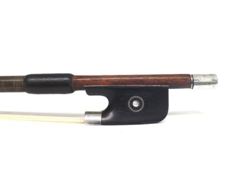 Silver mounted violin bow stamped Louis Bazin, the stick round, the ebony frog inlaid with silver rings enclosing pearl eyes 