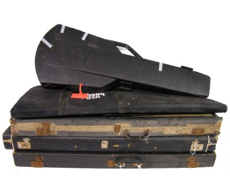 1980s Gibson electric guitar hard case in need of repair; together with a Gibson soft case and three vintage guitar hard case