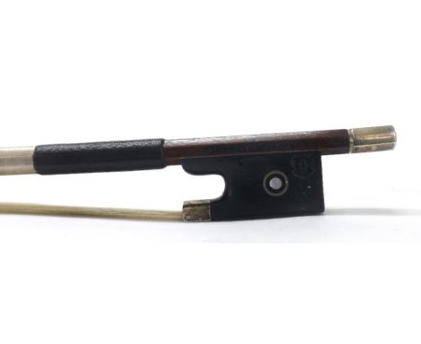 German silver mounted violin bow by and stamped Otto Durrschmidt, the stick octagonal, the ebony frog inlaid with silver ring