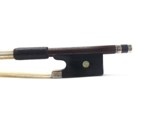 Silver mounted violin bow stamped F.N. Voirin á Paris, the stick round, the ebony frog inlaid with pearl eyes and the ebony a