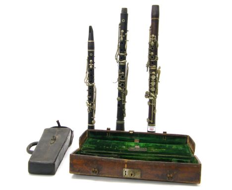 Rosewood and nickel mounted clarinet by and stamped Rudall Carte & Co., London, within an original fitted leather case; toget
