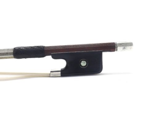 Silver mounted viola bow stamped Vtor Fetique á Paris, the stick round, the ebony frog inlaid with silver rings enclosing pea