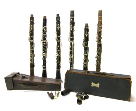 Rosewood and nickel mounted clarinet stamped Excelsior Class, Hawkes & Son... to the upper joint; together with five various 