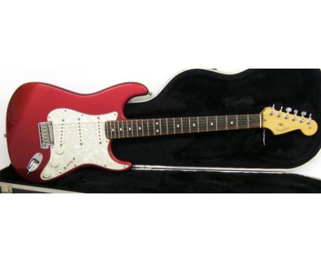 2001 Fender Stratocaster electric guitar, made in USA, ser. no. Z1xxxxx6, candy cola finish with light surface scratches, ele