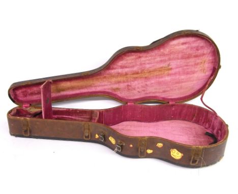 Vintage Master Kraft guitar hard case, with brown exterior and pink interior, in tired condition