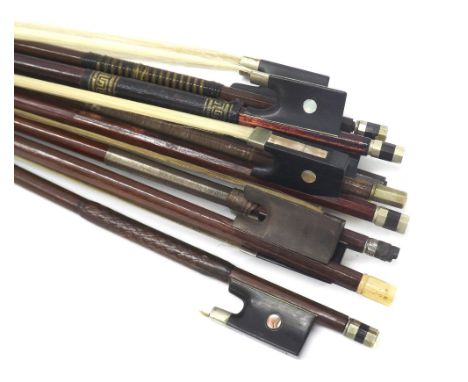 Eight various interesting old violin bows and a bow stick (9)