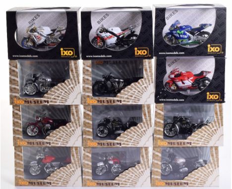 Twelve IXO 1:24 Scale Bikes, including Honda RC211VM, Vincent HRD Black Shadow,BSA Gold Star, Triumph T120 Bonneville, Brough