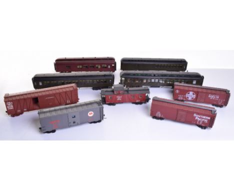 Collection of plastic 0 gauge Rolling Stock and track side building, four bogie passenger coaches, selection of Stock cars, o