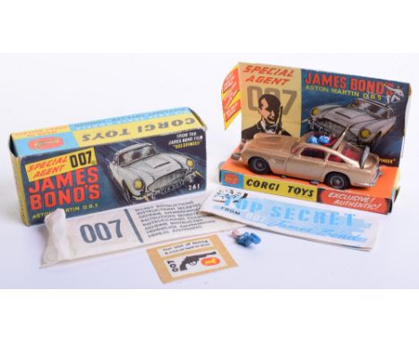 Corgi Toys 261 James Bond Aston Martin from the Film “Goldfinger” gold body, with ejector seat, rear bullet screen, retractab