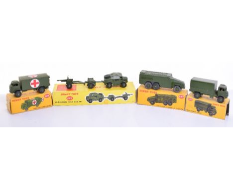 Four Boxed Military Dinky Toys including: 623 Army Covered Wagon, in good condition, with a fair original box, missing one en