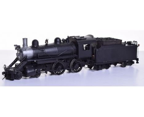 A brass 0 gauge model of a class R5 4-4-0 American locomotive and tender, finely detailed two-rail electric engine and tender