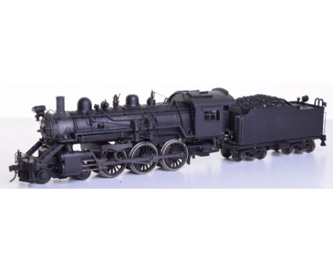 A brass 0 gauge model of a 4-6-0 American locomotive and tender, finely detailed two-rail electric engine and tender, details