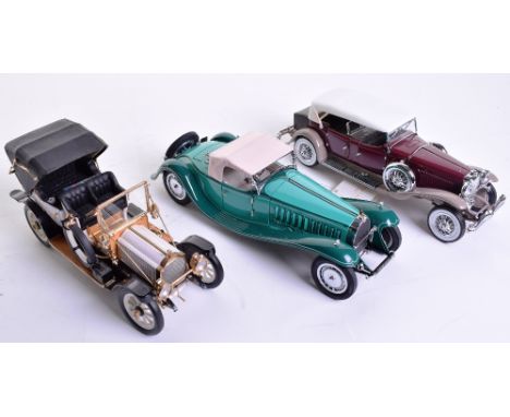 Three Franklin Mint Precision Models,1:24 scale, Packard Victoria, Deusenberg Tourer,Bugatti Royale, in near mint unboxed con