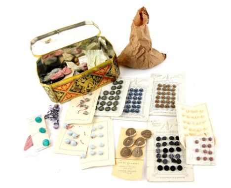 Collection of assorted vintage buttons including jet, and mother of pearl,  some on original cards, a metal tin with deer des