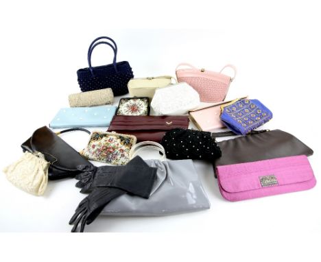 A group of vintage handbags including a cream bag box,  pastel pink and blue envelope bags claret leather, others and beaded 