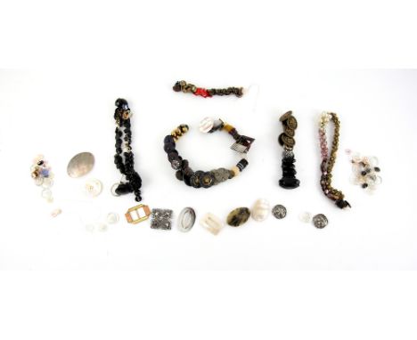 Collection of vintage assorted buttons to include mother of pearl, glass and metal.    