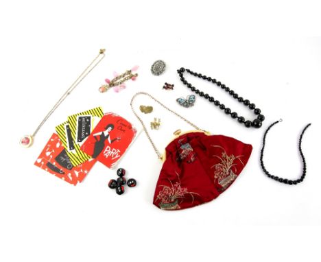 Group of vintage items including 1930's evening bag with paste clasp, 1950's party invitations, glass golly buttons, silver g