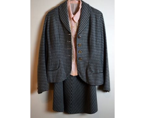 1940's wool suit of two tone grey stripe, labelled  Brenna sport, with a pink silk blouse, shorts sleeve with lace detail, an