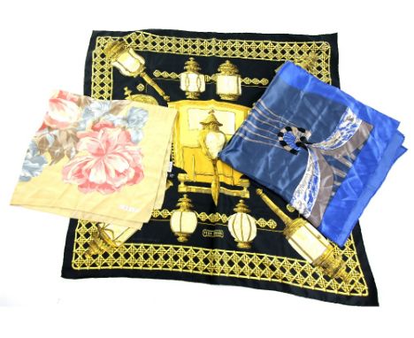 Hermes Scarf Feux de Route, in black and gold, Jaegar scarf with floral design in pink and blue, and a silk scarf in bue (3).